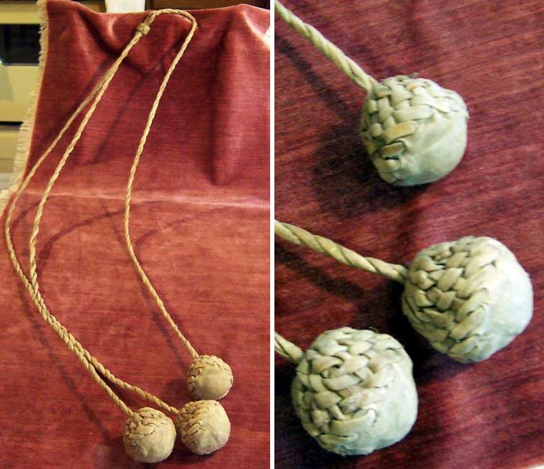 bola or boleadoras from argentina with braided leather ball covers
